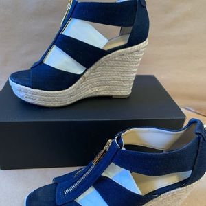 Brand new, excellent condition, MK size 6 heel